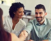 man woman hand shaking